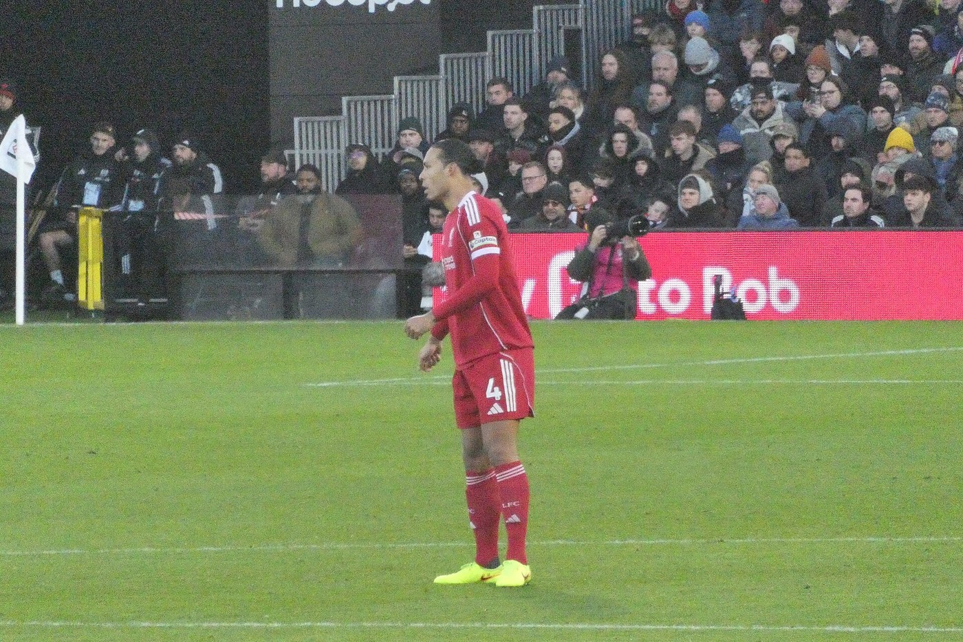 Liverpool captain Virgil van Dijk in a red kit on the pitch, January 2026