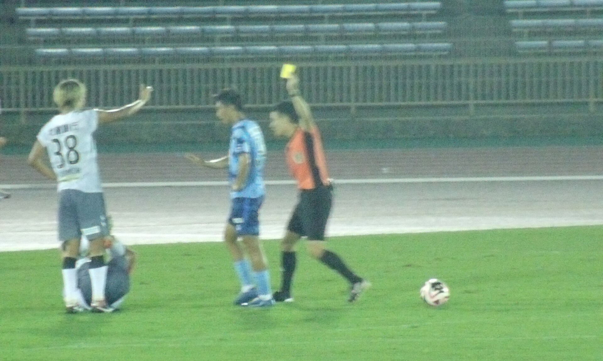 A yellow card shown during a match, in the Premier League suspensions guide